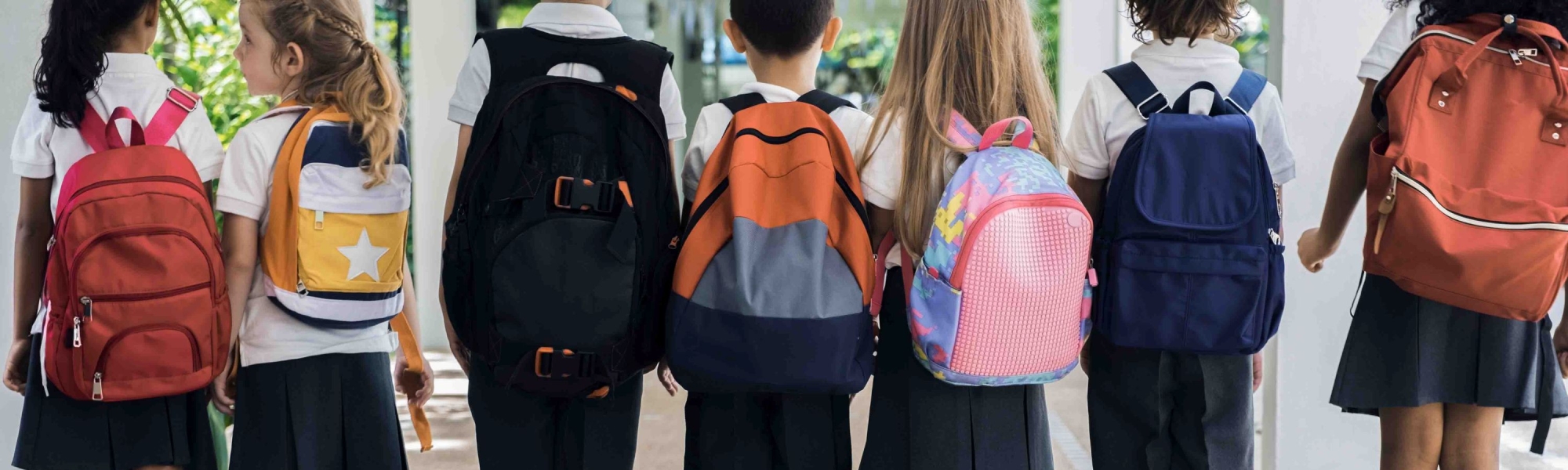 Children with backpacks